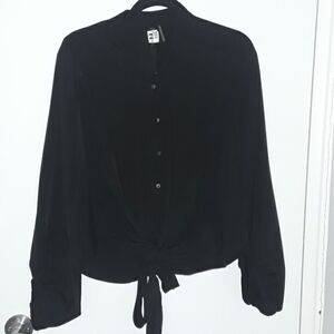 Like new!  Black long sleeve tie top